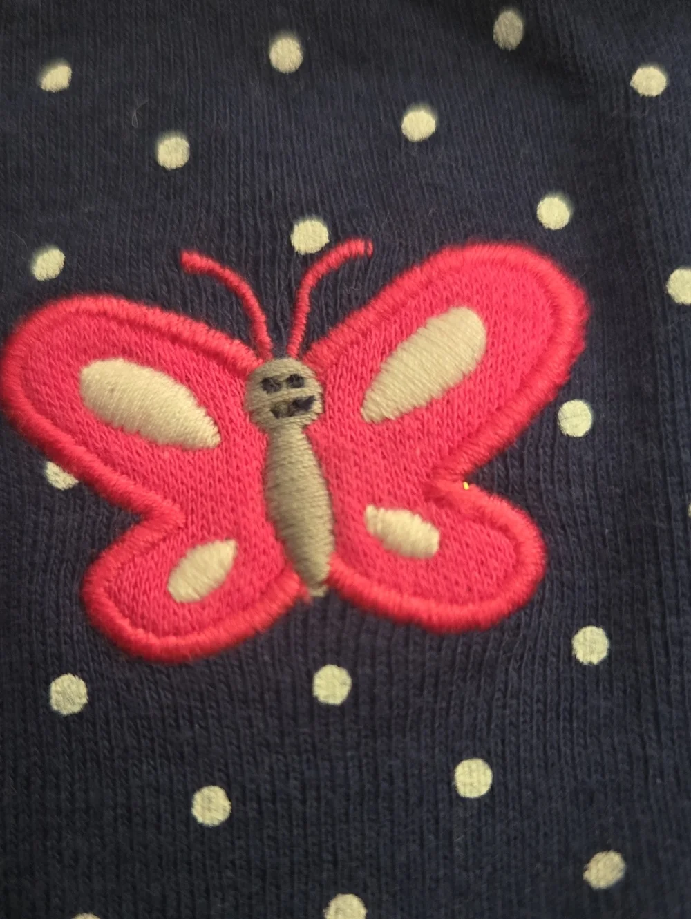 Carter's Onesie with polka dots and matching leggings.